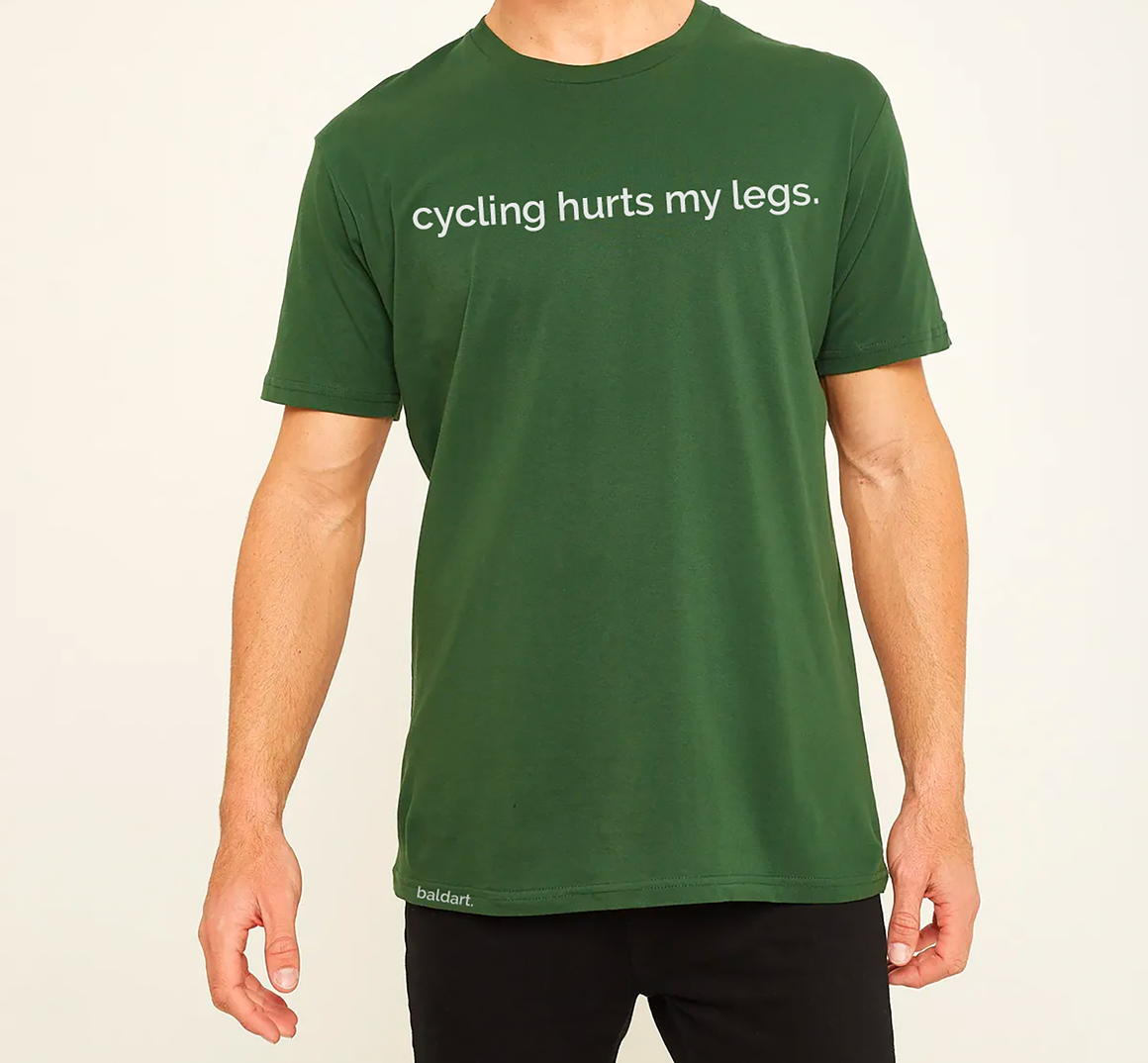 Green T Shirt featuring baldart. snippet story "cycling hurts my legs."