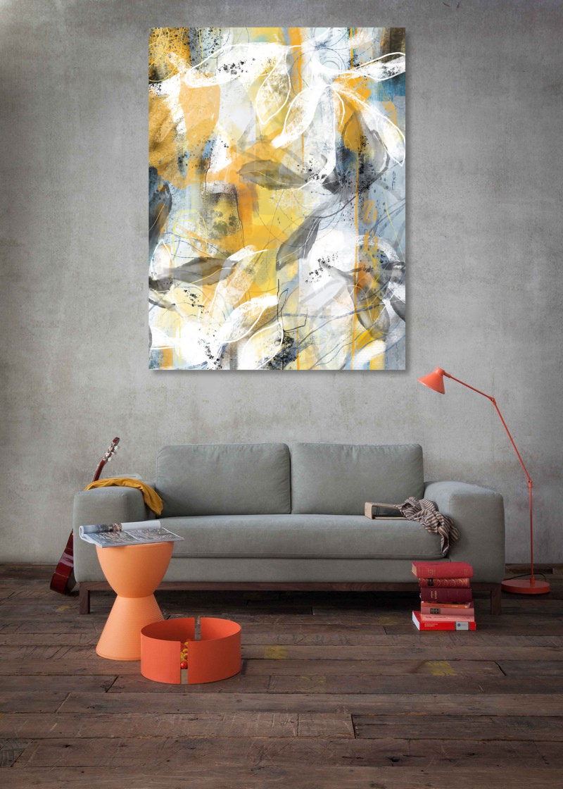 Modern living room with a gray sofa, orange side table, and abstract painting on the wall.