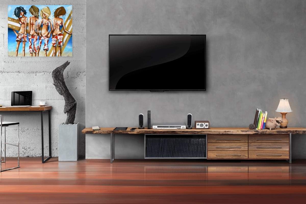 Modern living room with a TV mounted on the wall, wooden entertainment console, and decorative items.