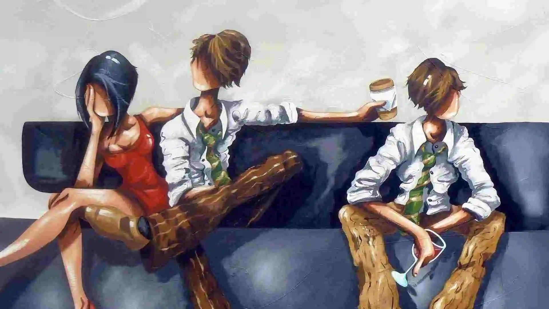 Three people sitting on a couch with a woman in a red dress and two men in suits.