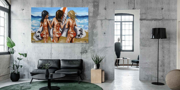 Modern interior with a large painting of three women on a beach.