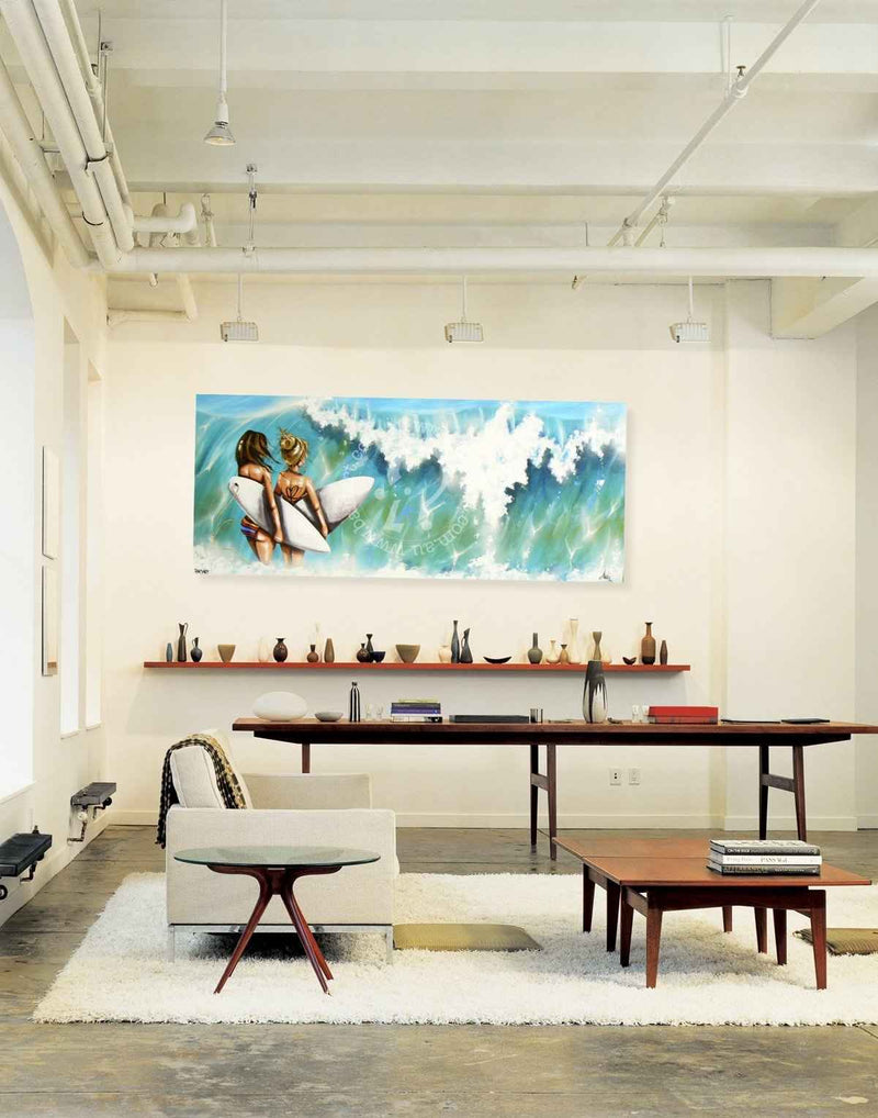 Modern living room with a large abstract painting on the wall, a sofa, and a coffee table.