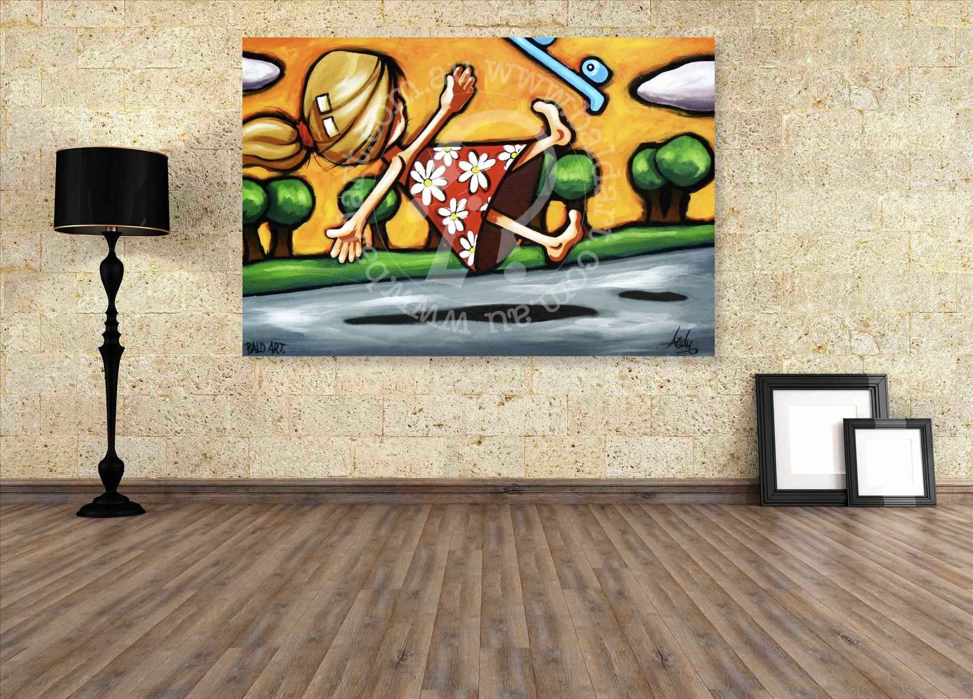 Colorful abstract painting on a wall with a lamp and frames on a wooden floor.