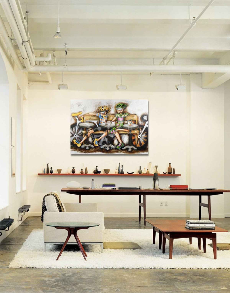 Modern office interior with a large painting on the wall, desk, and chairs.