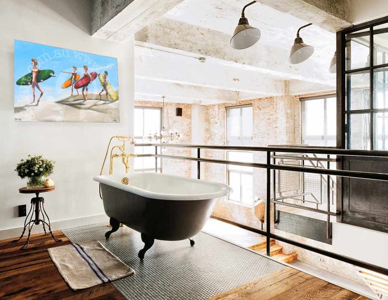 Modern bathroom with freestanding bathtub, large window, and decorative elements.