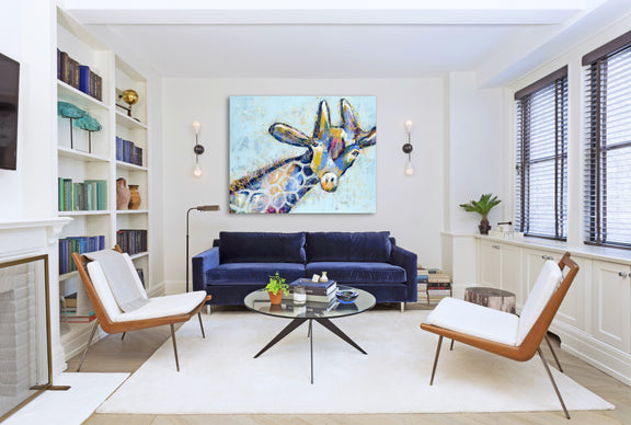 Abstract painting of a giraffe set against a vibrant blue background, showcasing bold colors and fluid shapes.