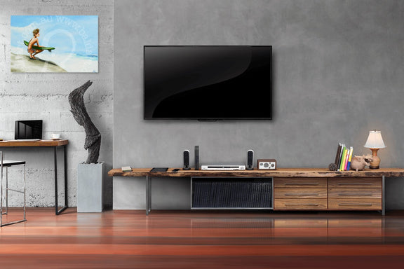 Modern living room with a television, desk, and decorative items.