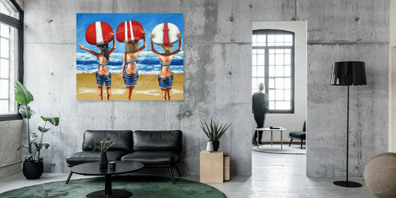 Modern interior with a painting of three people holding beach balls on a wall.
