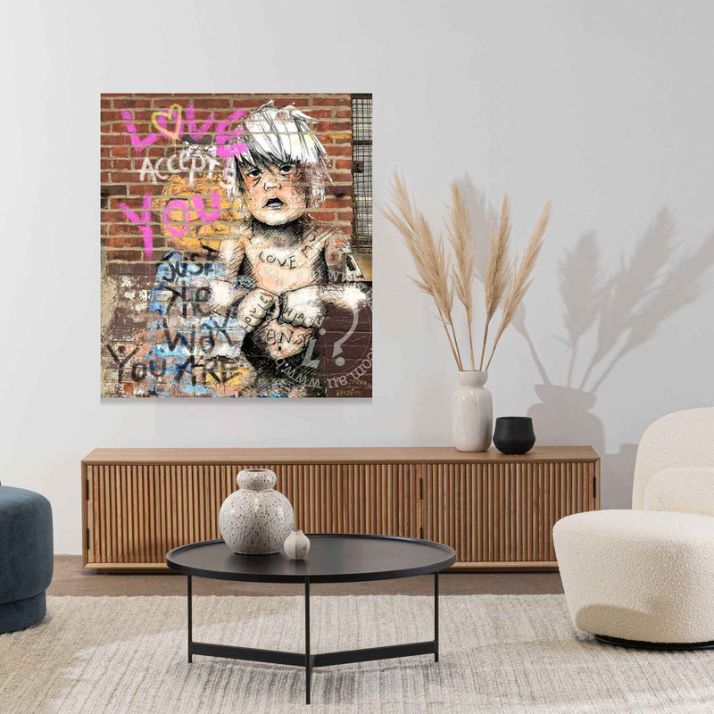 Modern living room with a large abstract painting on the wall, a wooden console table, and decorative items.