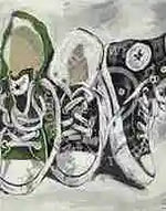 Three pairs of shoes on a snowy background