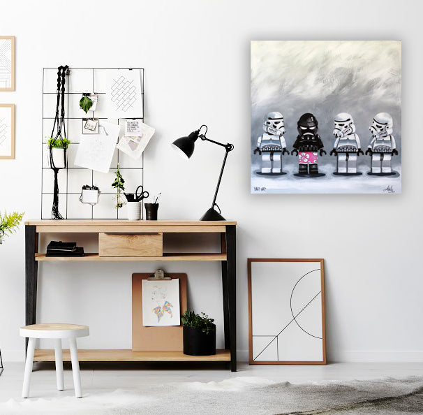  A canvas artwork featuring Star Wars stormtroopers, highlighting their distinctive white armor and military posture.
