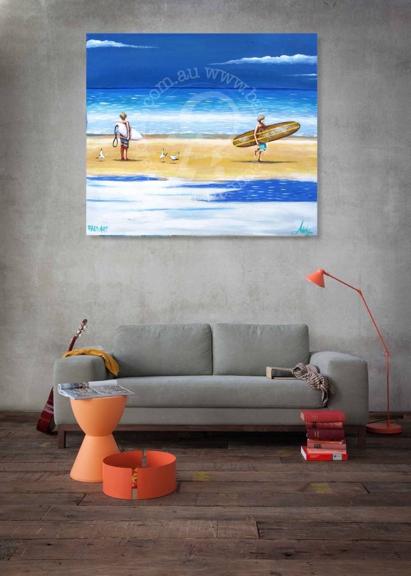 Painting of a beach scene with people and a surfboard on a gray wall above a gray sofa.