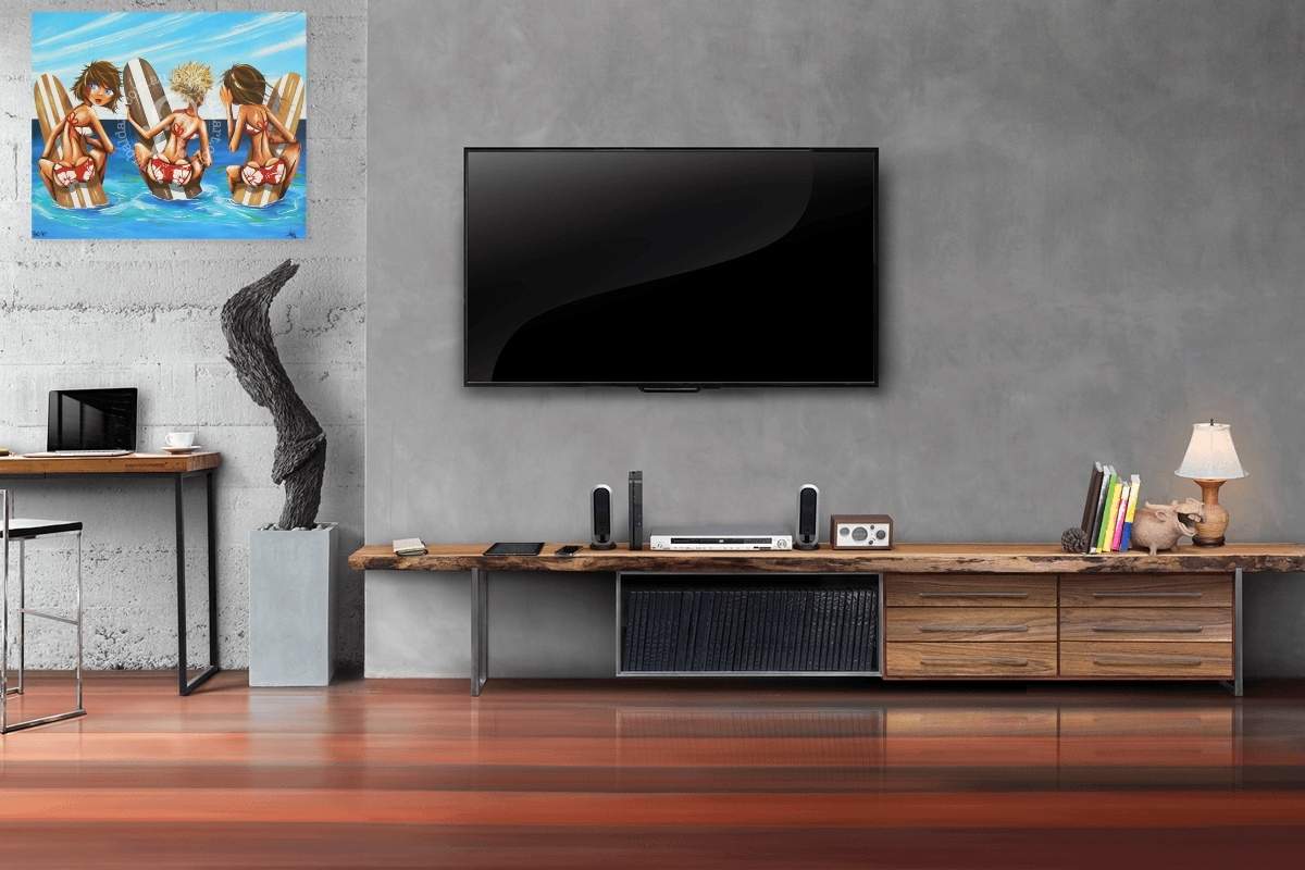 Modern living room with a television, entertainment console, and decorative items.