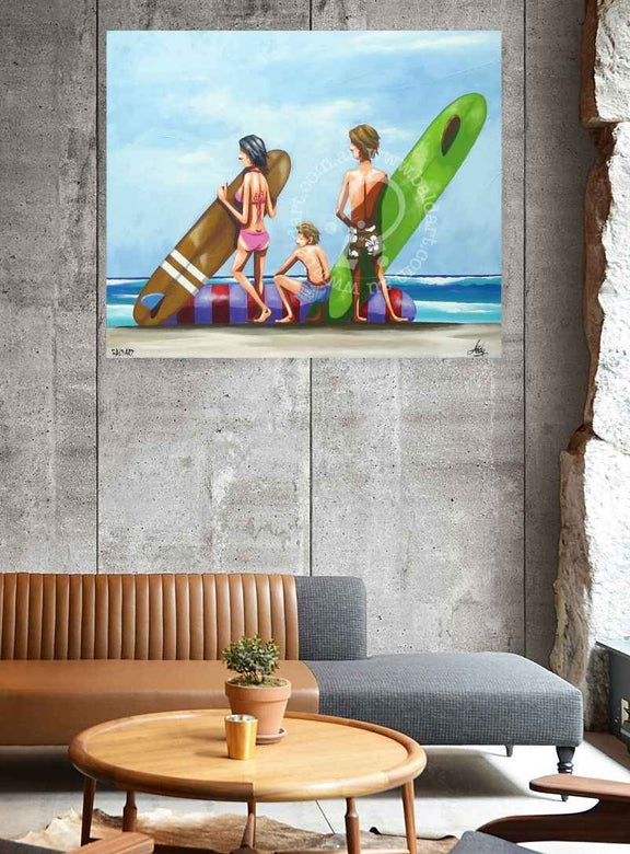 Painting of three people with colorful surfboards on a wall above a living room.