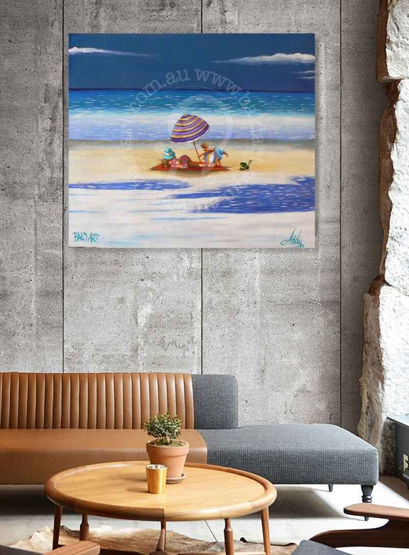 Beach scene painting on a concrete wall above a sofa and coffee table.