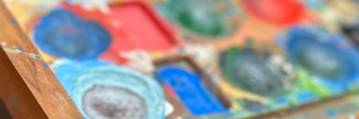 Close-up of a colorful game board with pieces on a wooden surface