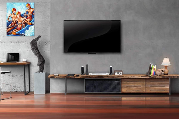 Modern living room with a television mounted on the wall, wooden cabinet, and decorative items.