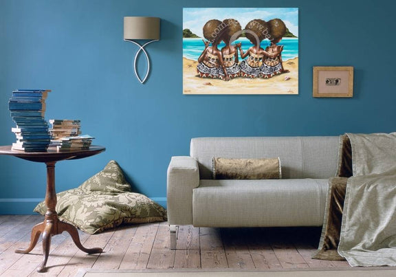 Living room with a gray sofa, wooden side table, and wall art.