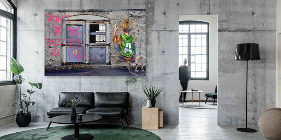 Modern living room with a large abstract painting on the wall.