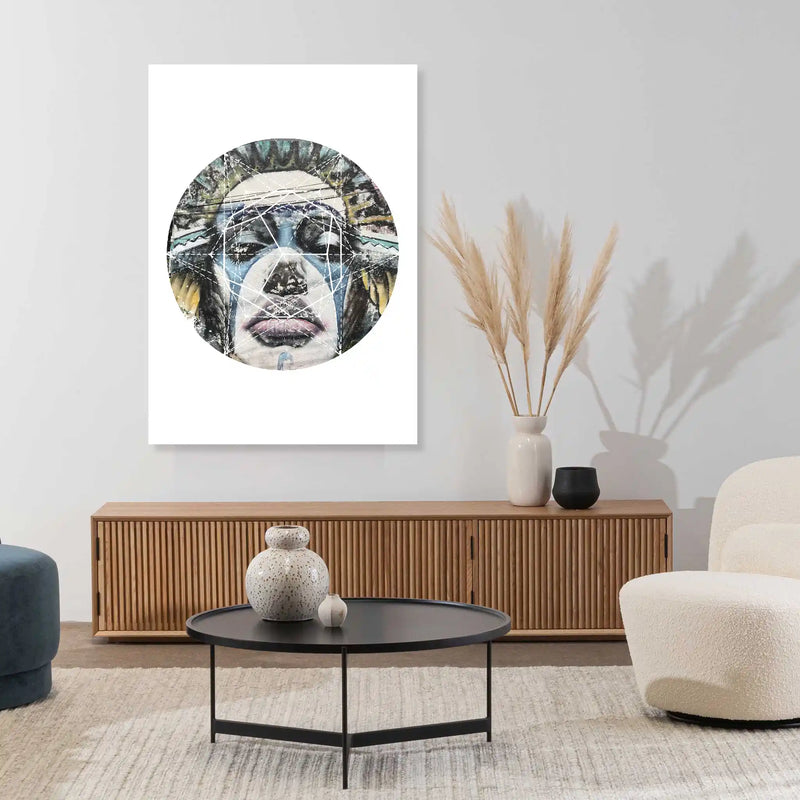 Modern living room with a round abstract painting on the wall, wooden cabinet, and decorative items.