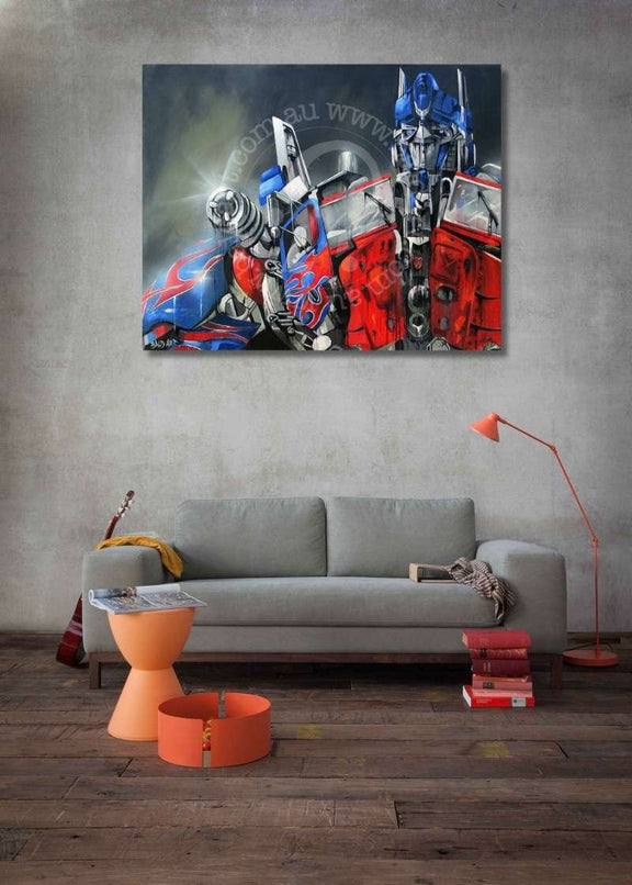 Living room with a large robot painting on the wall above a gray sofa.