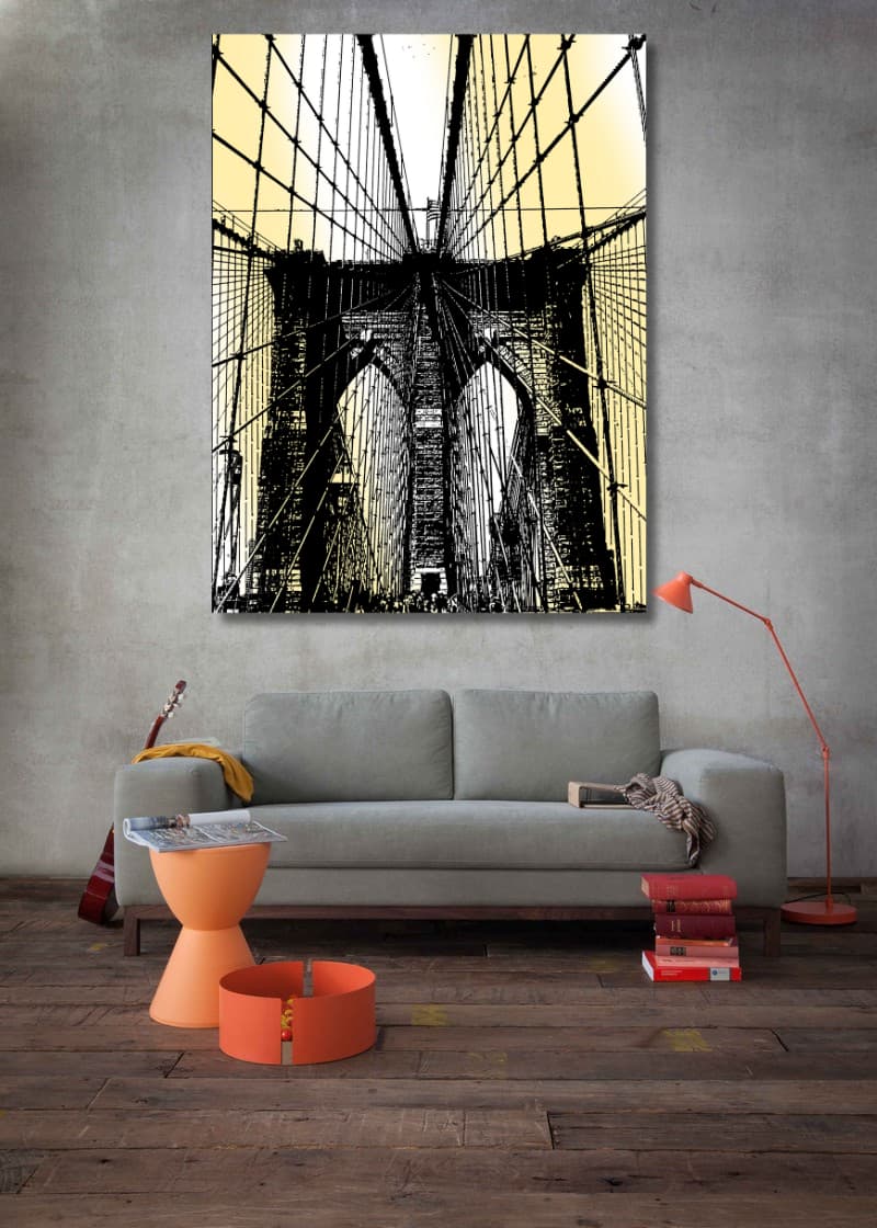 Modern living room with a large painting of a bridge on the wall.