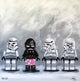 A playful artwork featuring storm troopers clad in pink underwear, contrasting their usual armor in a vibrant setting.