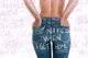 The back view of a woman featuring the text "be naked when I get home" prominently displayed on her skin.