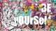 A colorful graffiti-style artwork with the text 'BE YOUR SELF' prominently displayed, on a wall covered with various colorful designs and artistic elements.