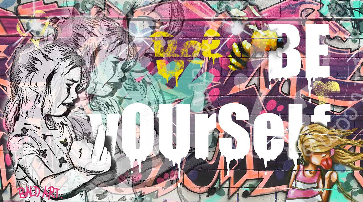 A colorful graffiti-style artwork with the text 'BE YOUR SELF' prominently displayed, on a wall covered with various colorful designs and artistic elements.
