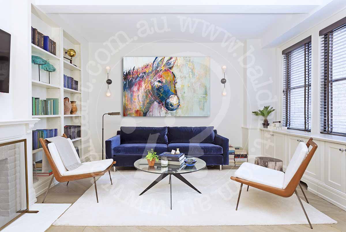 A living room showcasing a blue couch and a horse painting, blending comfort with artistic decor.