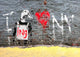 Graffiti art on a wall featuring a stylized duck with a heart and the text 'I DUCKING LOVE NY' in a bold, cursive font on a distressed background.