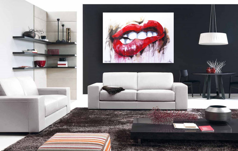 A bright living room featuring white furniture and a large, colorful painting on the wall.