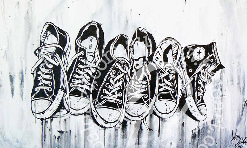 A colorful painting featuring a group of black and white sneakers, highlighting their shapes and patterns in a creative way.