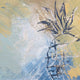 Abstract painting of a pineapple set against a vibrant blue and yellow background.