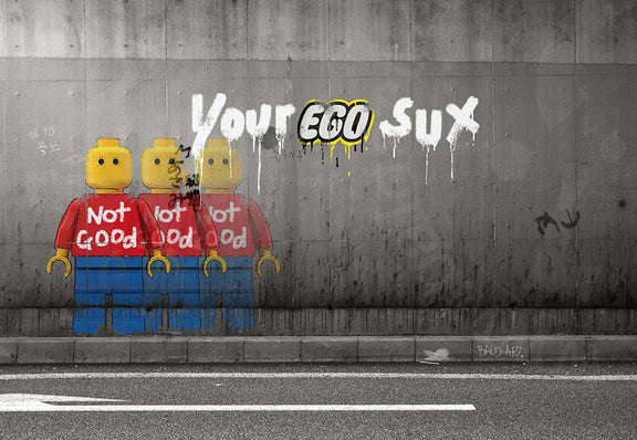 Graffiti-style artwork with the phrase 'YOUR EGO SUX!' and three stylized figures wearing red shirts on a dark background.