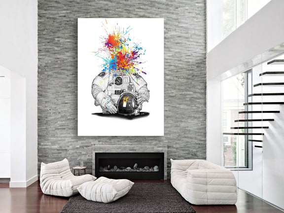 A bold artwork depicting a skull, surrounded by an explosion of colorful paint splatters, creating a lively composition.